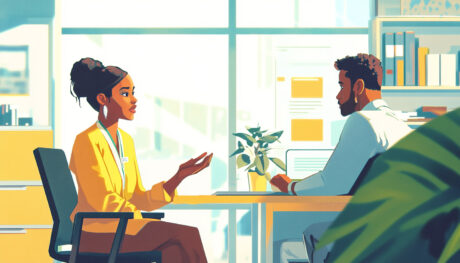 two-people-talking-in-an-office