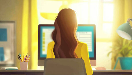 a-women-working-on-the-computer-checking-off-items-on-a-checklist