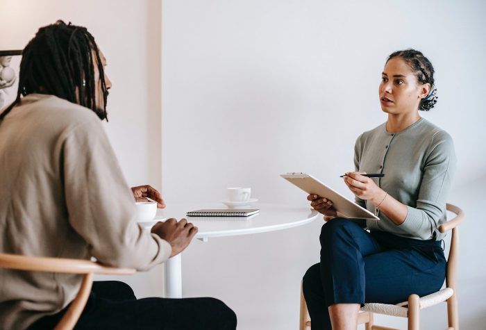 man-being-interviewed-by-a-woman