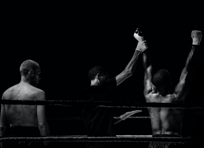 winning-and-losing-boxer-standing-next-to-each-other
