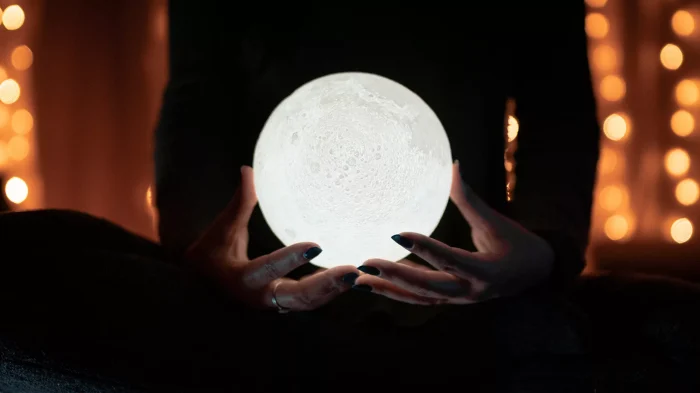 woman-holding-a-crystal-ball